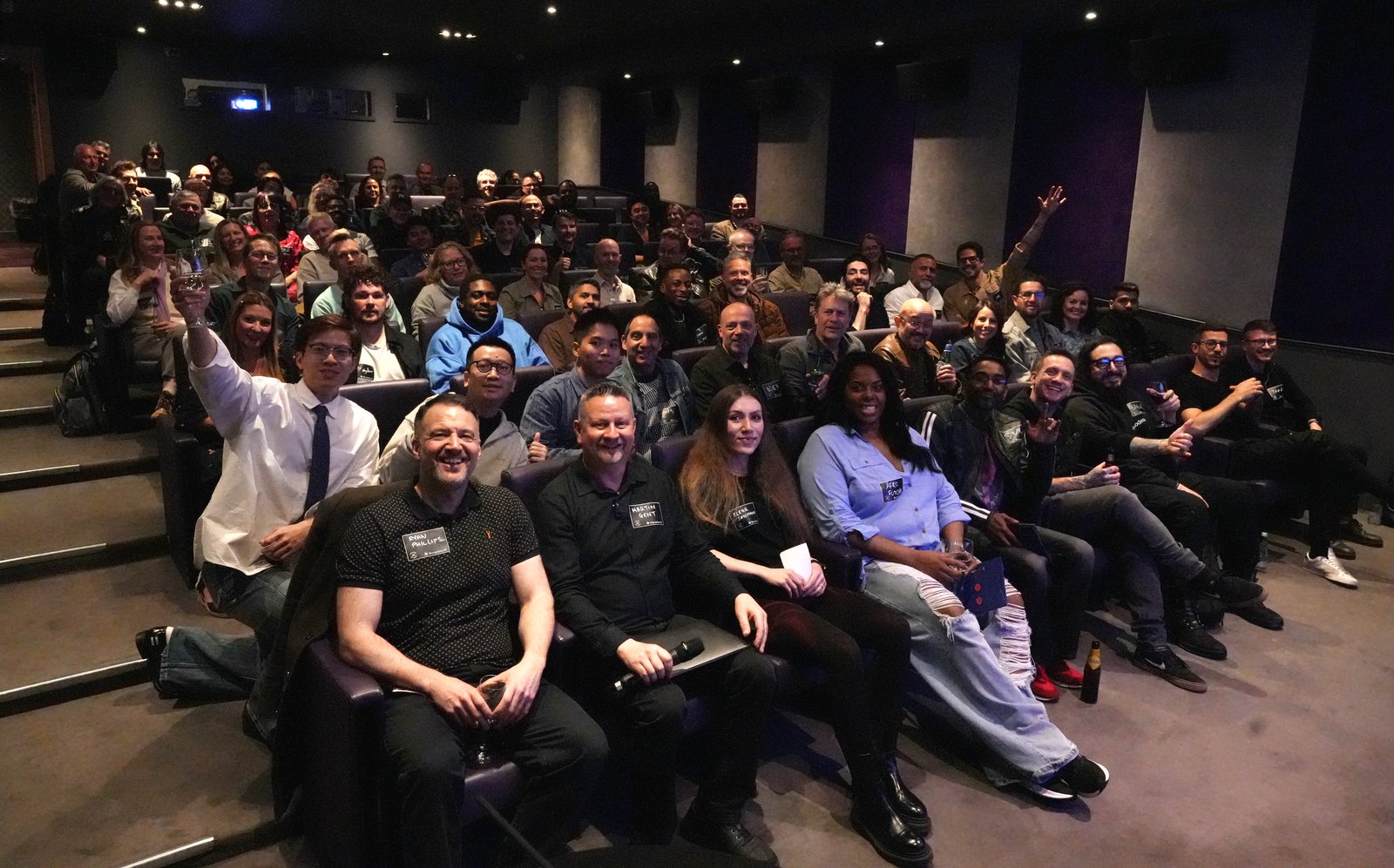 A packed cinema audience at a Creative AI Network screening