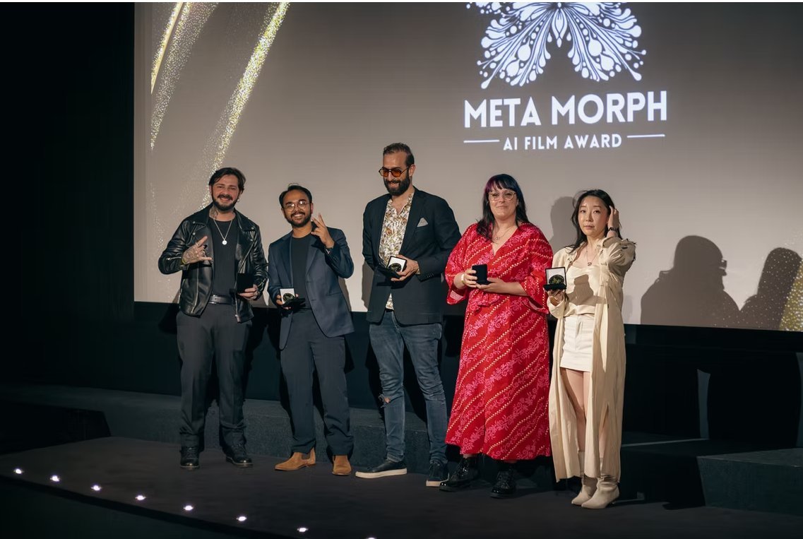 Petra at the MetaMorph AI Film Award ceremony, London — onstage with the other winners