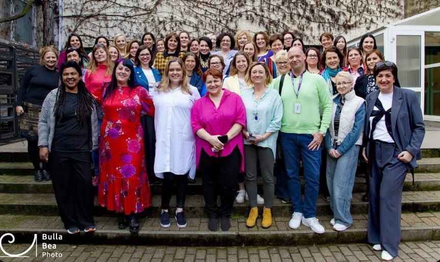 A large group of women at the Budapest event empowering women with AI